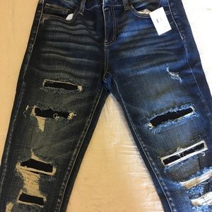 Ripped Wax jeans brand new